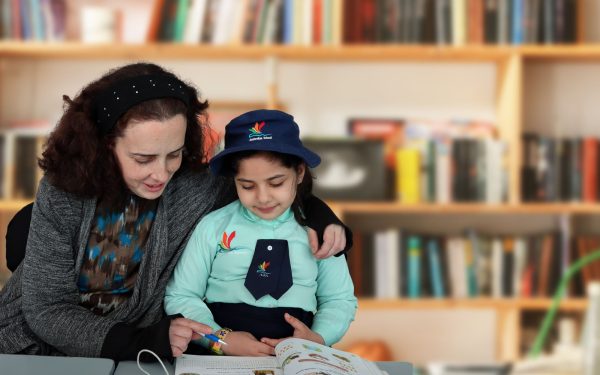 AIS teacher with a student